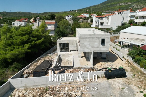 photo 24 Kaštel Novi, modern villa under construction with pool and sea view.